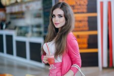 girl-standing-with-soda-hand (1).jpg